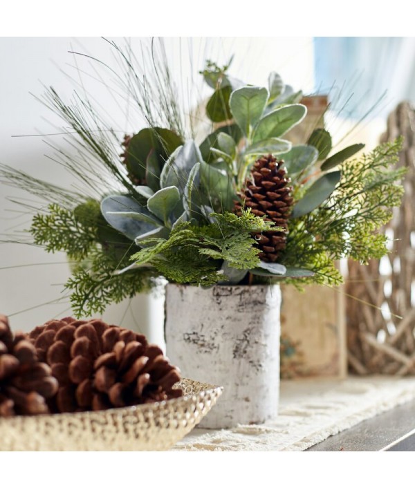 Mixed flower arrangement of greenery and pine cones